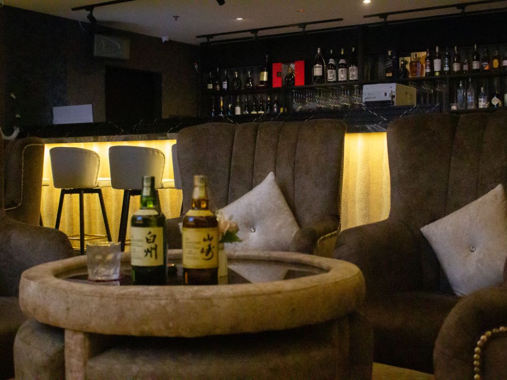 Japanese whisky bottles on VIP table